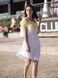 White mini sundress with lemon tulle ruffles