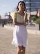 White mini sundress with lemon tulle ruffles