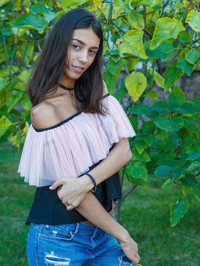 Black top with pink powder tulle ruffles