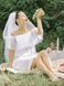 White mini sundress with white tulle ruffles