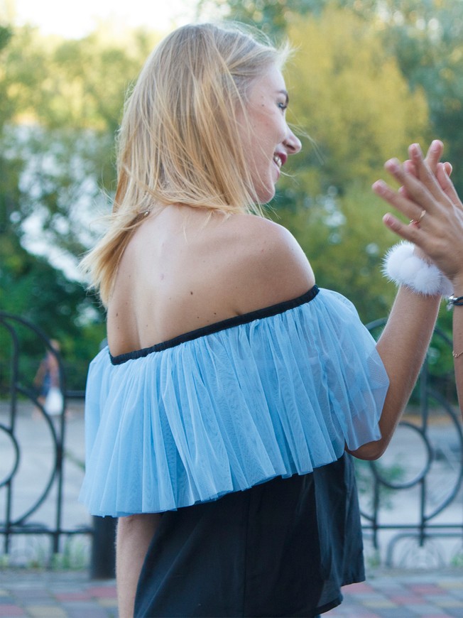 Black top with blue tulle ruffles